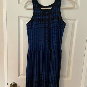 Blue and black checked racerback knit flared dress